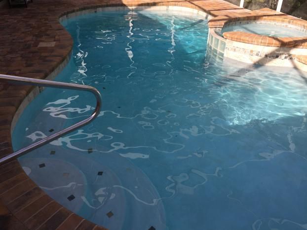 After a completed pool project in Spring Hill, FL by Trinity Pools, Inc. From Ugly To Amazing!